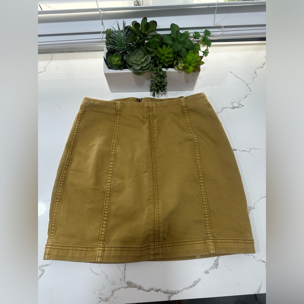 Free People denim miniskirt mustard , size 8. GUC